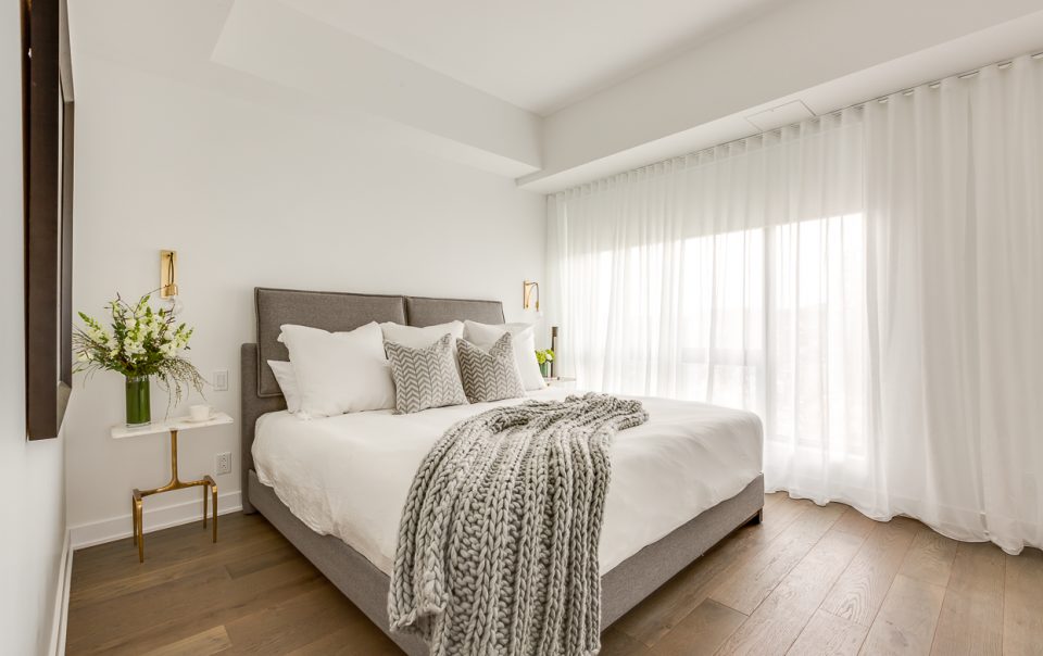 Wide plank floor master bedroom