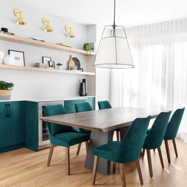 Contemporary kitchen design green cabinets and green chairs