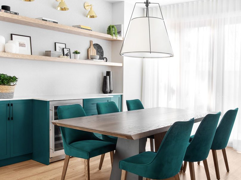Contemporary kitchen design green cabinets and green chairs